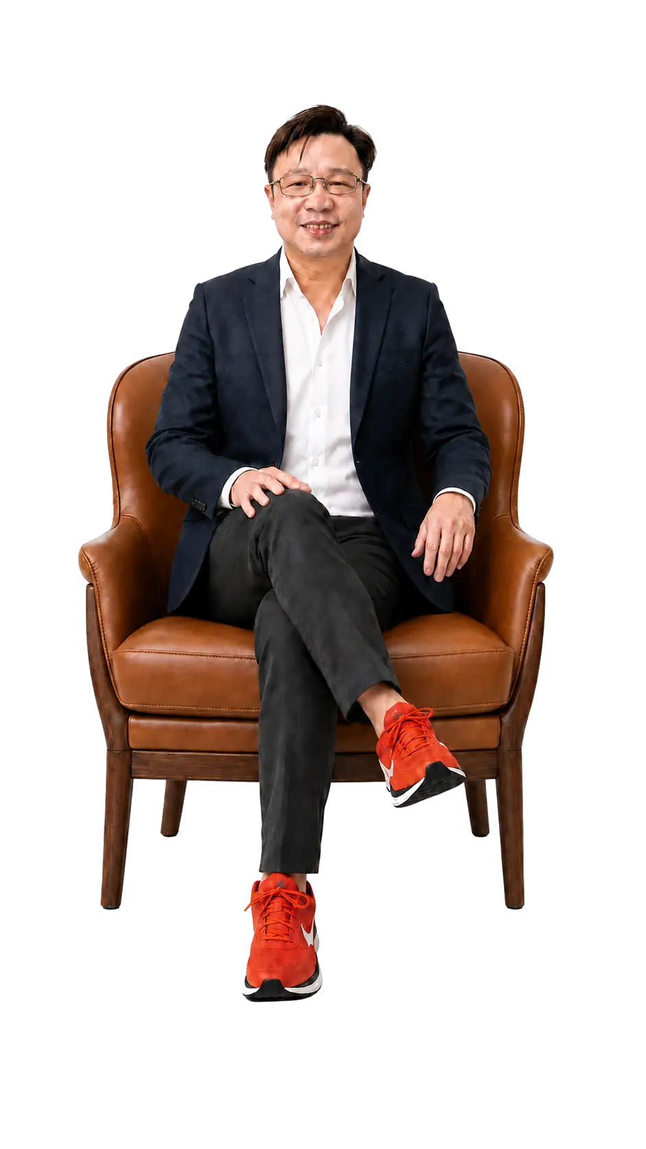 Sean See seated in a luxury leather chair